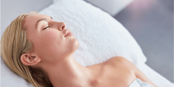 Woman with smooth skin after microneedling